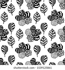 Cute seamless pattern with primitive childish hand-drawn flowers and leaves black ink on a white background in Scandinavian style. Stylish modern wrapping paper, textile design.
Vector illustration.