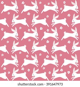Cute seamless pattern with rabbits and daisies