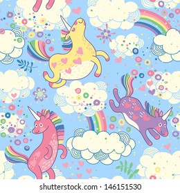 Cute seamless pattern with rainbow unicorns in the clouds. Vector illustration.