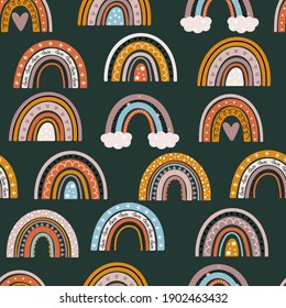 Cute seamless pattern with rainbows in childlike style. Scandinavian kids illustration on a dark green background. Trendy baby texture for fabric textile wallpaper apparel wrapping.