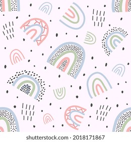 Cute seamless pattern with rainbows. Childrens vector background for posters, room design, textiles.