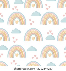 Cute seamless pattern with rainbows, clouds and hearts isolated on white background.