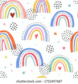 cute seamless pattern with rainbows and graphic decorative elements for baby textile and fabric prints, wallpaper, scrapbooking, bedding, wrapping paper, etc. EPS 10