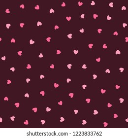 Cute seamless pattern with scattered small hearts. Endless romantic print. Vector illustration.