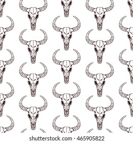 cute seamless pattern of skulls bull on a white background. hand-drawn illustration