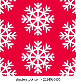 Cute seamless pattern with snowflakes on a red background. Background for Christmas and New Year with beautiful white snowflakes for a wallpaper, textile print, wrapping paper etc.