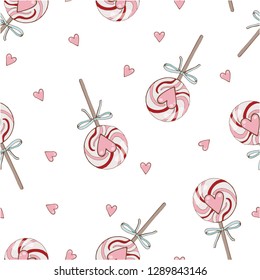 Cute seamless pattern with tasty candies on a white background. Hand drawn graphics with vector elements isolated. Can be used on wrapping paper, fabric, background for different images.