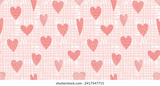 Cute seamless pattern with tender red hand drawn textured hearts on peach textured background. Lovely coral vector texture with doodle heart shapes for St. Valentines wrapping paper, textile