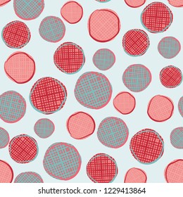 Cute seamless pattern of textured circles of different sizes. Vector repeat design with pale blue, teal, blush pink, red and orange. For textiles, invitations, birthdays, fashion and gift wrapping.