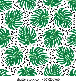 Cute seamless pattern with tropical palm leaves