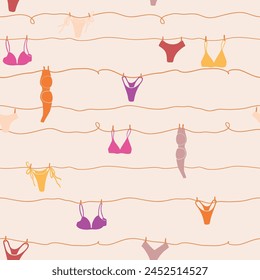 Cute seamless pattern with underwear hanging on a string. Swimsuit, bikini, panties, bra in summer day. Summer time vacation and travel aesthetic. Groovy and fun vector tropical background