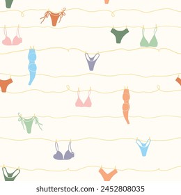 Cute seamless pattern with underwear hanging on a string. Swimsuit, bikini, panties, bra in summer day. Summer time vacation and travel aesthetic. Groovy and fun vector tropical background