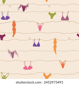 Cute seamless pattern with underwear hanging on a string. Swimsuit, bikini, panties, bra in summer day. Summer time vacation and travel aesthetic. Groovy and fun vector tropical background