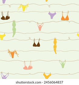 Cute seamless pattern with underwear hanging on a string. Swimsuit, bikini, panties, bra in summer day. Summer time vacation and travel aesthetic. Groovy and fun vector tropical background