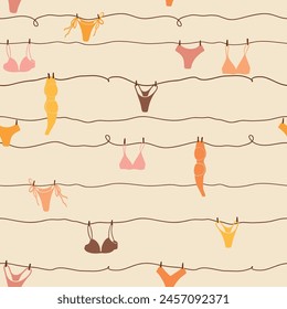 Cute seamless pattern with underwear hanging on a string. Swimsuit, bikini, panties, bra in summer day. Summer time vacation and travel aesthetic. Groovy and fun vector tropical background