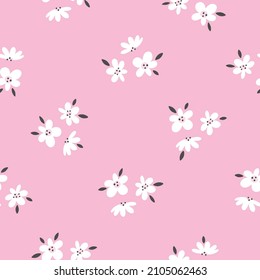 Cute seamless pattern with white flowers on a pink background. Texture for baby girl fashion, wallpapers, print. Vector design. 
