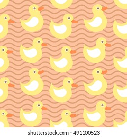 Cute seamless pattern with yellow duck on wave background