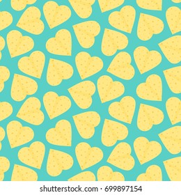 Cute seamless pattern with yellow hearts made of tortillas. Nice mexican tortilla hearts texture for textile, wrap paper, banner, cover, cafe and restaurant menu design