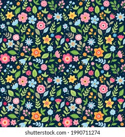 Cute seamless vector floral pattern. Endless print made of small colorful flowers. Summer and spring motifs. Dark blue background. Stock vector illustration.