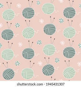 Cute seamless vector pattern background illustration with yarn balls and knitting needles	