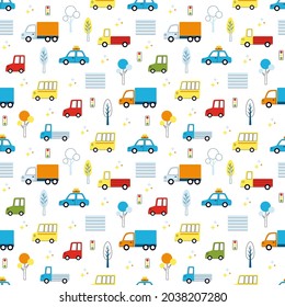 Cute seamless vector pattern with cars, trucks and buses. Funny illustration for kids with repeated ornament of city transport on winter white background