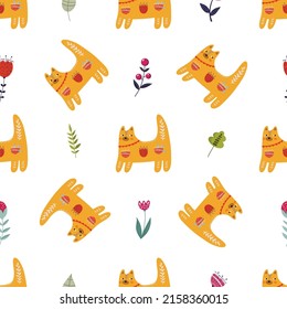 cute seamless vector pattern with cats and colorful flowers. hand-painted folk illustration