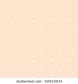 Cute seamless yellow pattern with white dots. Polka dot background