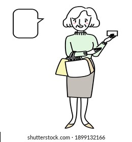 Cute senior woman with shopping bags. Happy mature woman with several shopping bags showing blank card in her hand. Cheerful elderly female customer holding shopping bag and presenting card in hand.