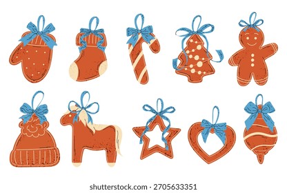 Lindo conjunto de Navidades galleta de jengibre. Comida dulce festiva. Decoraciones del árbol de Navidad. Panes de jengibre con moños.