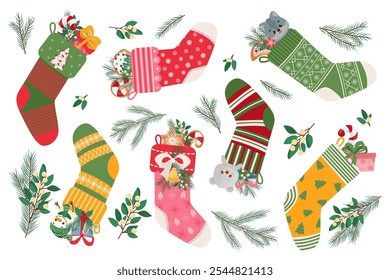 Cute set of Christmas stockings with presents, toys, fir branches and sweets. Holiday decor. Vector illustration for cards, posters.