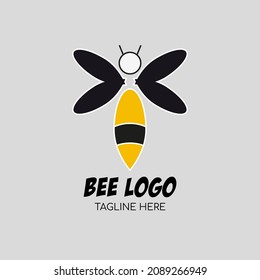 Cute and simple bee logo for bees in yellow, black and white