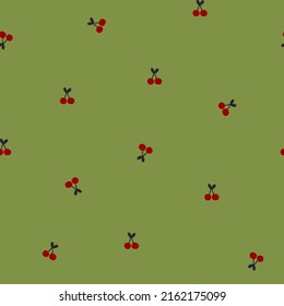 Cute and simple  hand-drawn pattern with tiny cherries on pistachio green background. Cute fruit print in naive style for underwear, dresses ,fabric design, wallpaper, wrapping paper