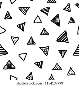 Cute simple pattern with different hand painted triangles. Vector seamless template background. Colorful memphis style illustration.