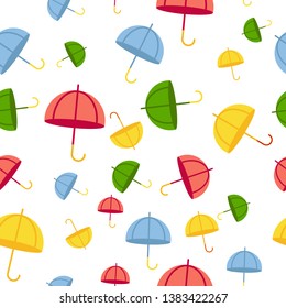 Cute simple seamless pattern of multicolored umbrellas