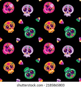 Cute skulls on different colors. Happy halloween.  Day of the Dead in Mexico. Seamless pattern. Vector.