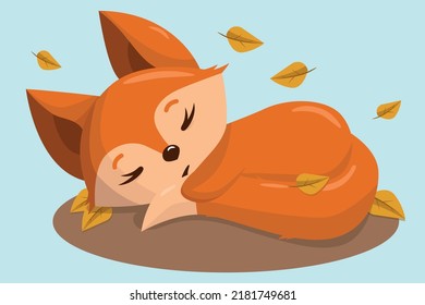 Cute sleeping fox cub in autumn foliage