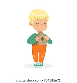 Cute smiling little boy standing and holding birdhouse cartoon vector Illustration