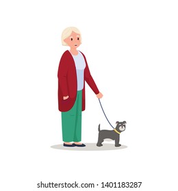 Cute smiling senior woman walking with cute dog