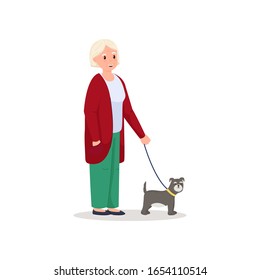 Cute smiling senior woman walking with cute dog