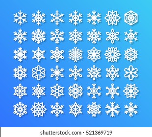 Cute Snowflake Collection Isolated On Blue Background. Flat Icons Of Snow Flakes Silhouette. 