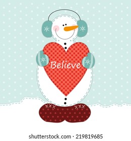 Cute snowman with big heart as retro fabric applique in shabby chic style ideal for very merry christmas