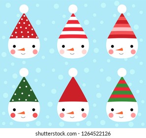Cute snowmen heads with red and green hats for Christmas decor
