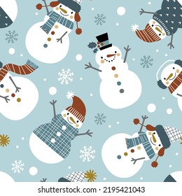 Cute snowmen seamless vector pattern. Perfect for textile, wallpaper or print design.