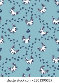 Cute sphinx Cat seamless pattern on blue  background with paws. Kitten face drawing in sketch style. Animal repeat print for textile, kid clothes, wrapping paper. repeated ornament kitten paw track