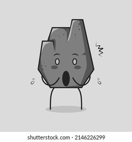 cute stone cartoon with surprised expression and mouth open. suitable for logos, icons, symbols or mascots. grey