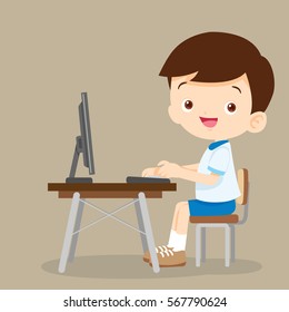 cute student boy working with computer.