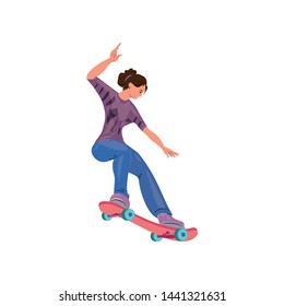 Cute student girl in blue jeans riding skateboard