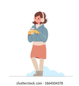 Cute stylish girl in a jacket and a skirt drinking coffee. Nice young woman enjoyed winter.