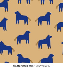 Cute and stylish seamless pattern with  blue horses on peach background. Funny childish vector cartoon background for dresses,textiles, wallpapers, designer paper, etc