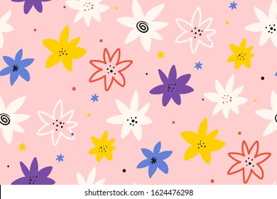 Cute summer background. Abstract floral seamless pattern.Trendy hand drawn textures. Modern design for,paper, cover, fabric. Multi-colored flowers on a pink background. Spring wildflowers.